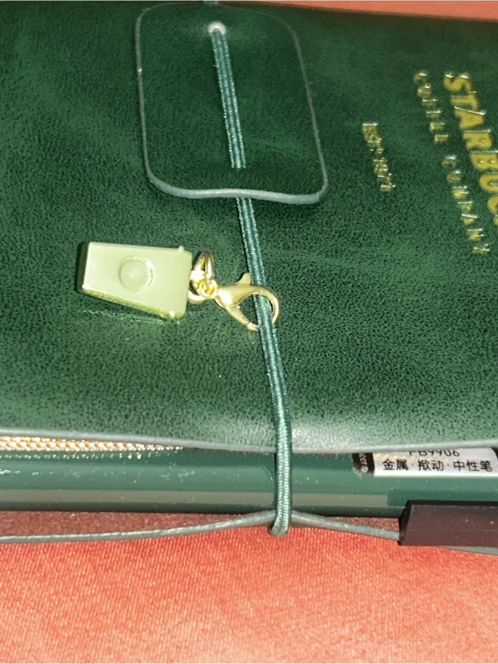 Starbucks Dark Green 2026 planner with Gold Cup Charm